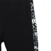 Kép 2/2 - Rugalmas anyagú, oldalán feliratos díszcsíkos női leggings