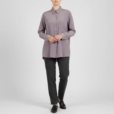 Elején gombos és zsebes női felső