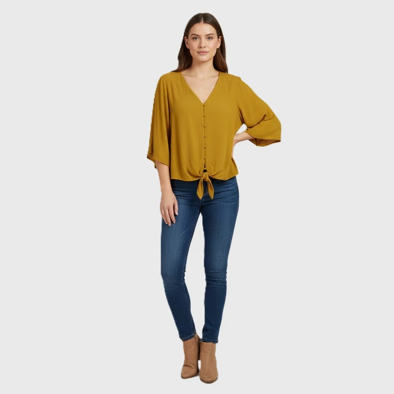 Elején gombos, alján megkötős női felső