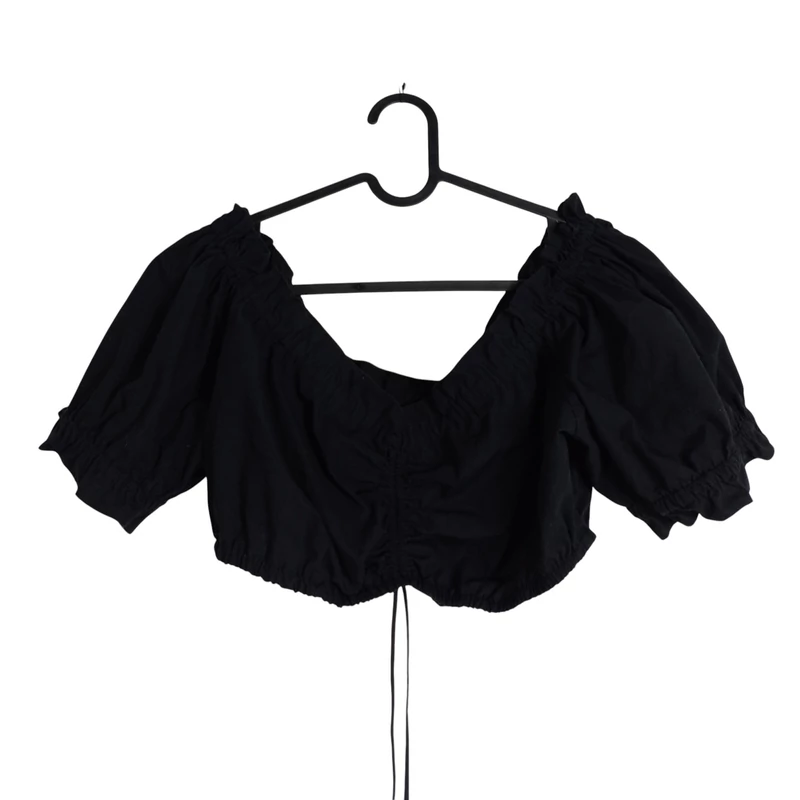 Nyakrészén és alján gumis női top