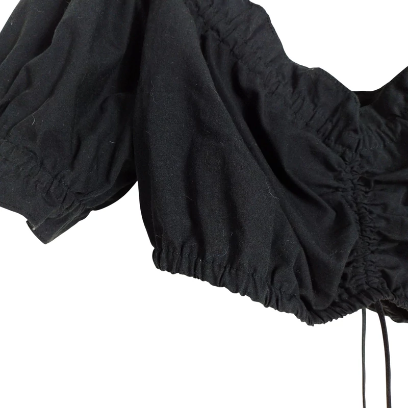 Nyakrészén és alján gumis női top