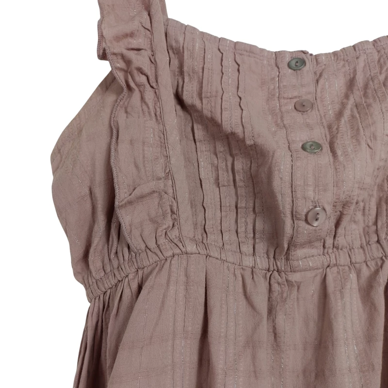 Mellrésze alatt gumis, fodorral díszített női felső