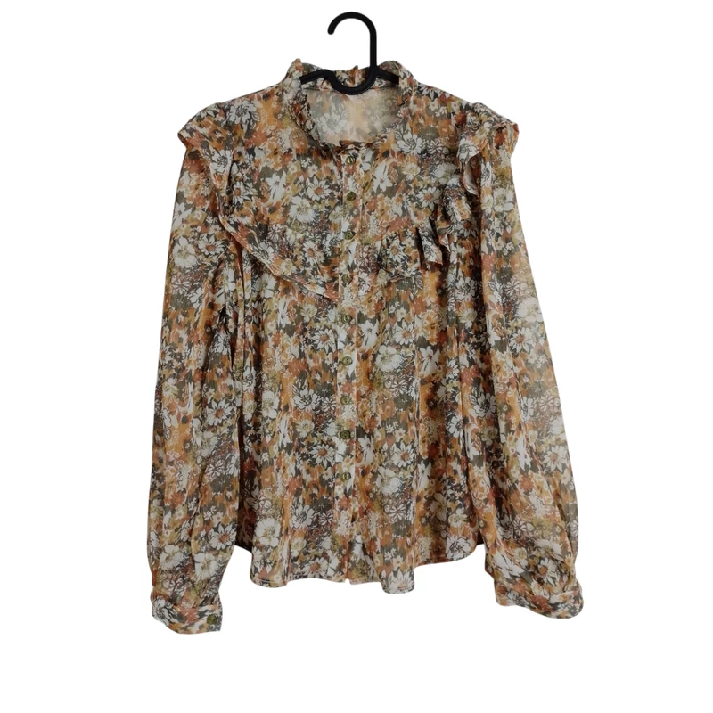 Fodorral díszített, virágmintás női felső