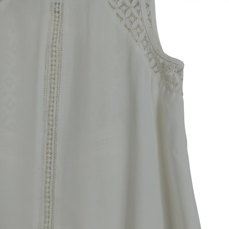 Csipkemintás, hátulján hosszított női felső