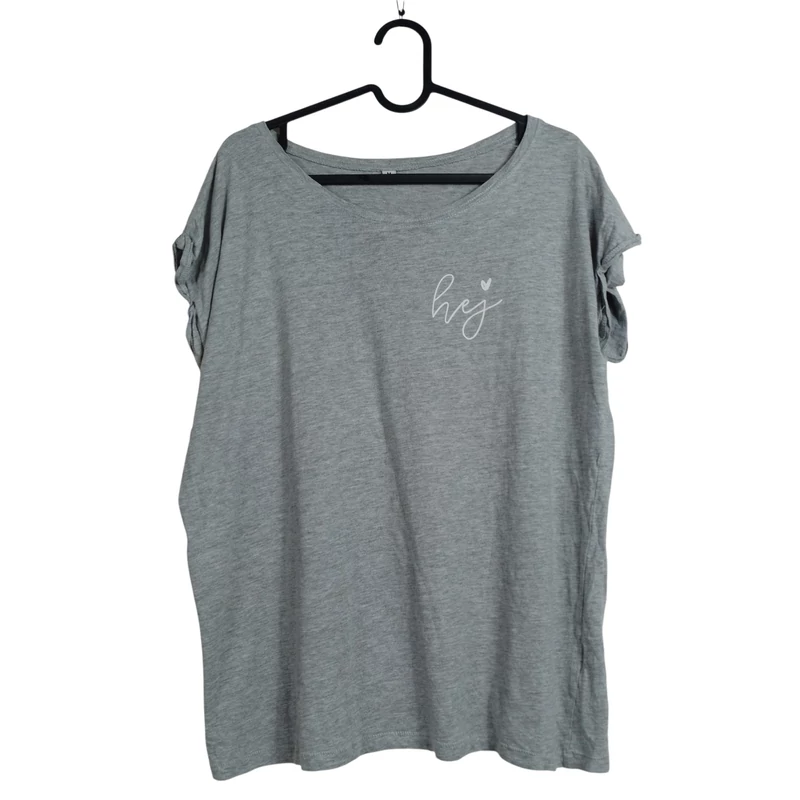 Ujja végén hajtókás, elején mintás női felső