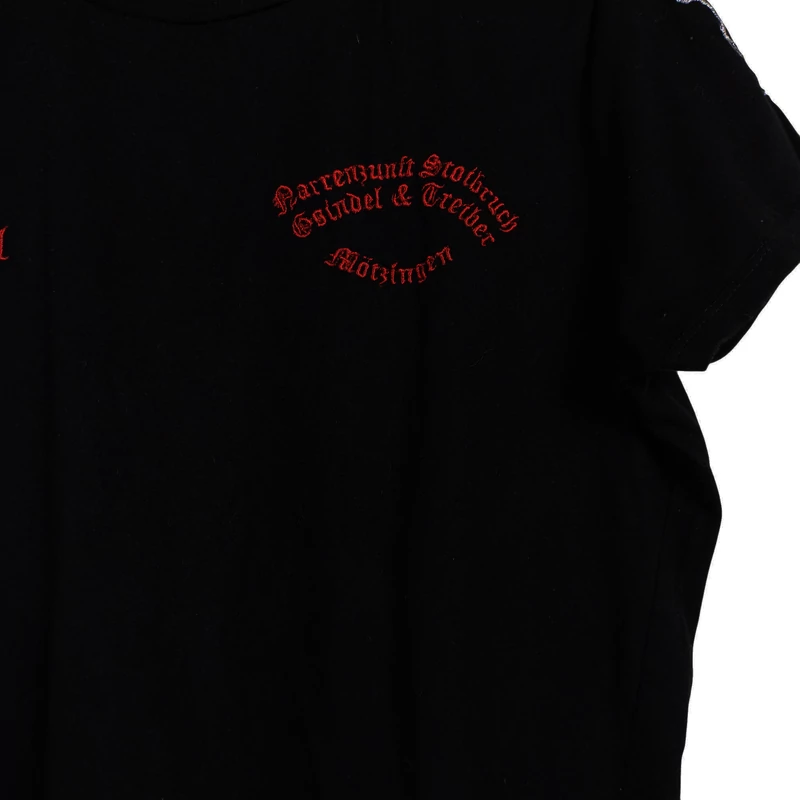 Elől-hátul varrással díszített női felső