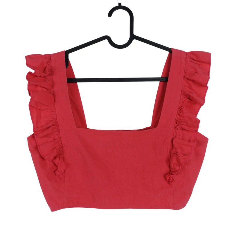 Vállán fodros, hátán gumírozott női felső