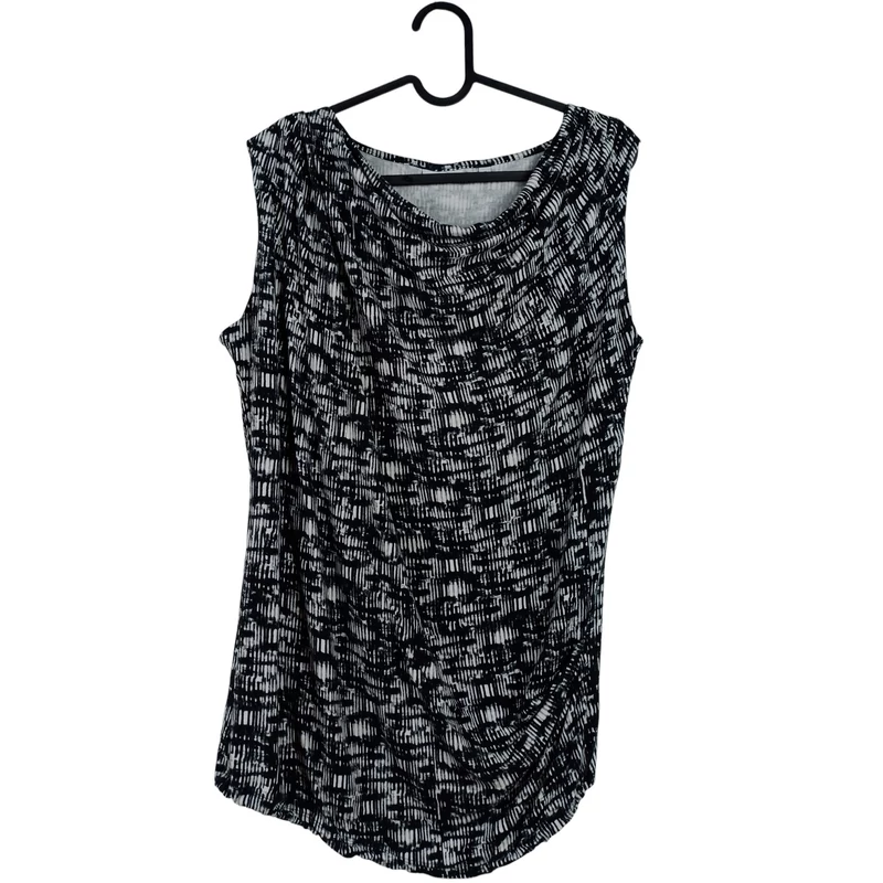 Elején ejtett anyagú, egyik oldalán húzott varrású, mintás női felső