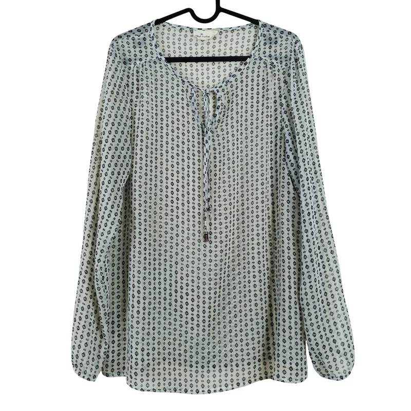 Áttetsző anyagú, mintás női felső