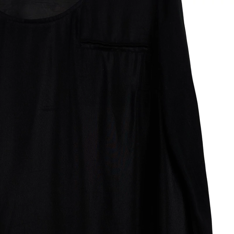 Áttetsző anyagú, egyik vállán cipzáras női felső