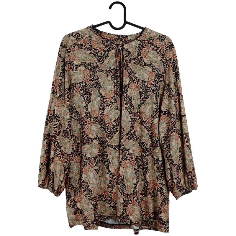 Nyakrészén megkötős, mintás női felső 