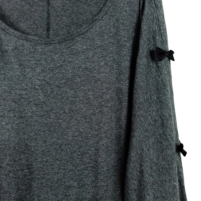 Ujján apró masnikkal díszített női felső 