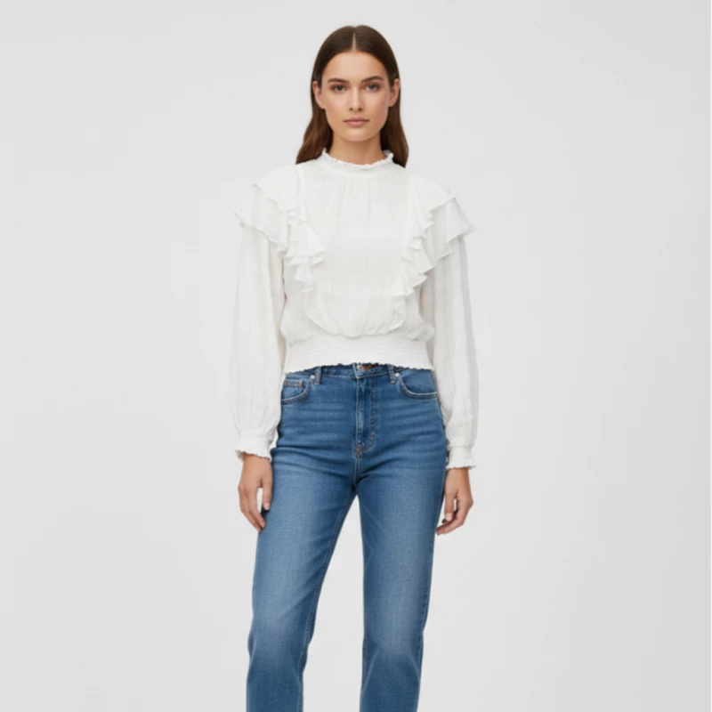 Alján és ujja végén gumírozott, elején fodros női felső