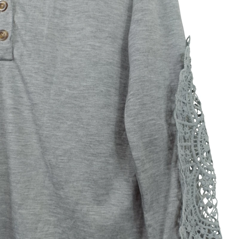 Világosszürke színű, hosszú ujjú női felső, M méret